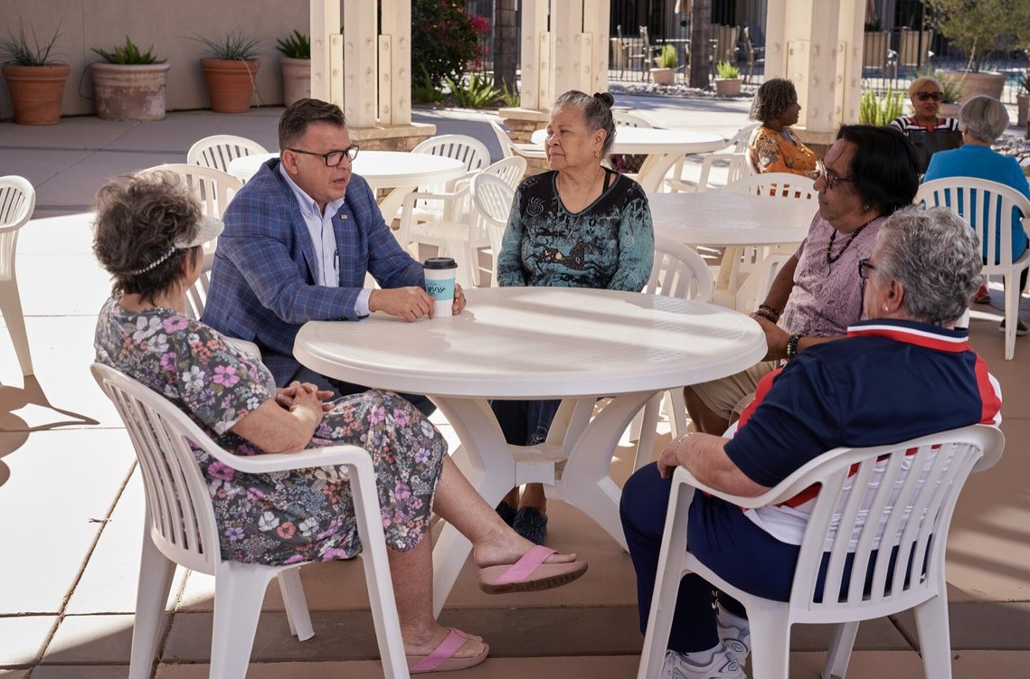 Jaime Hurtado listening to Moreno Valley residents at a community senior center